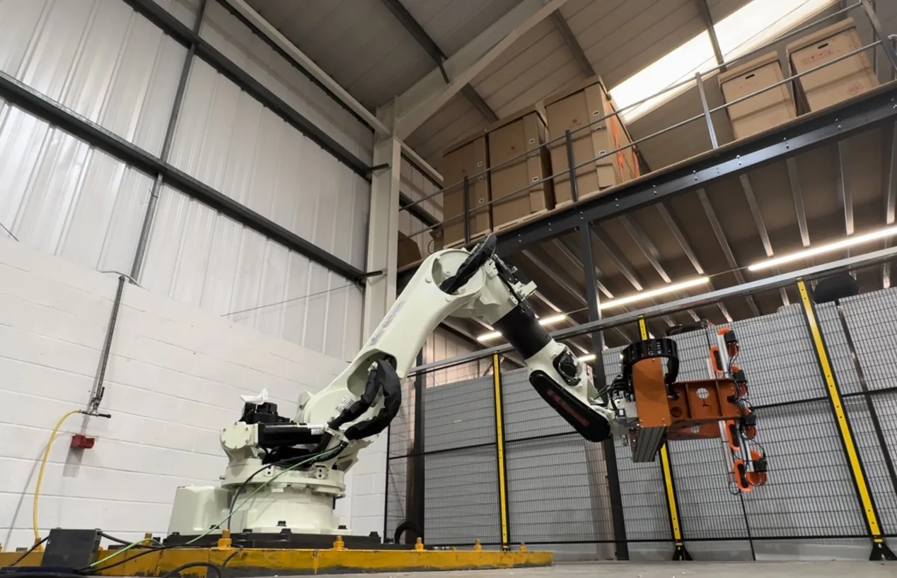 Fox Precision Tooling 6-axis robot cell installation with a custom carton-handling EOAT